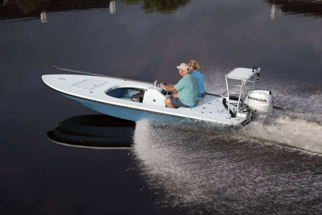 Ankona Advent cruising on glassy water