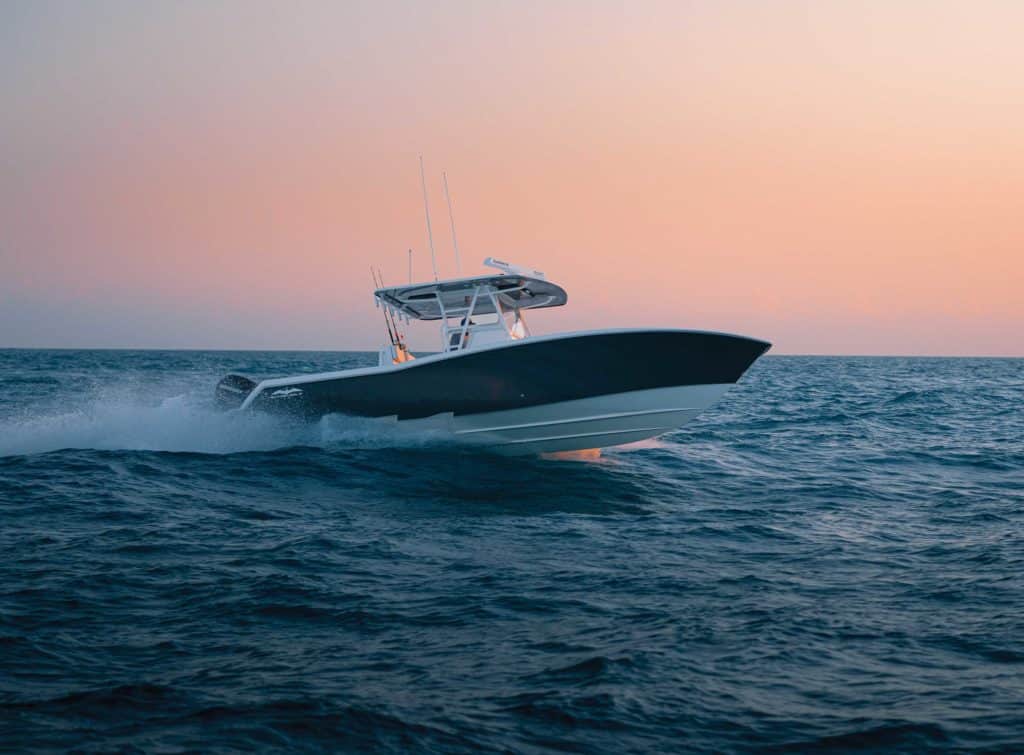 Invincible 33 Open Fisherman blasting offshore