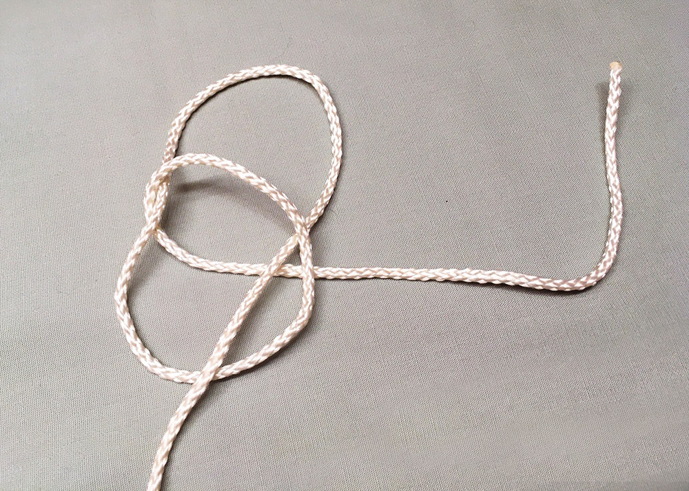 Second loop of Perfection Knot