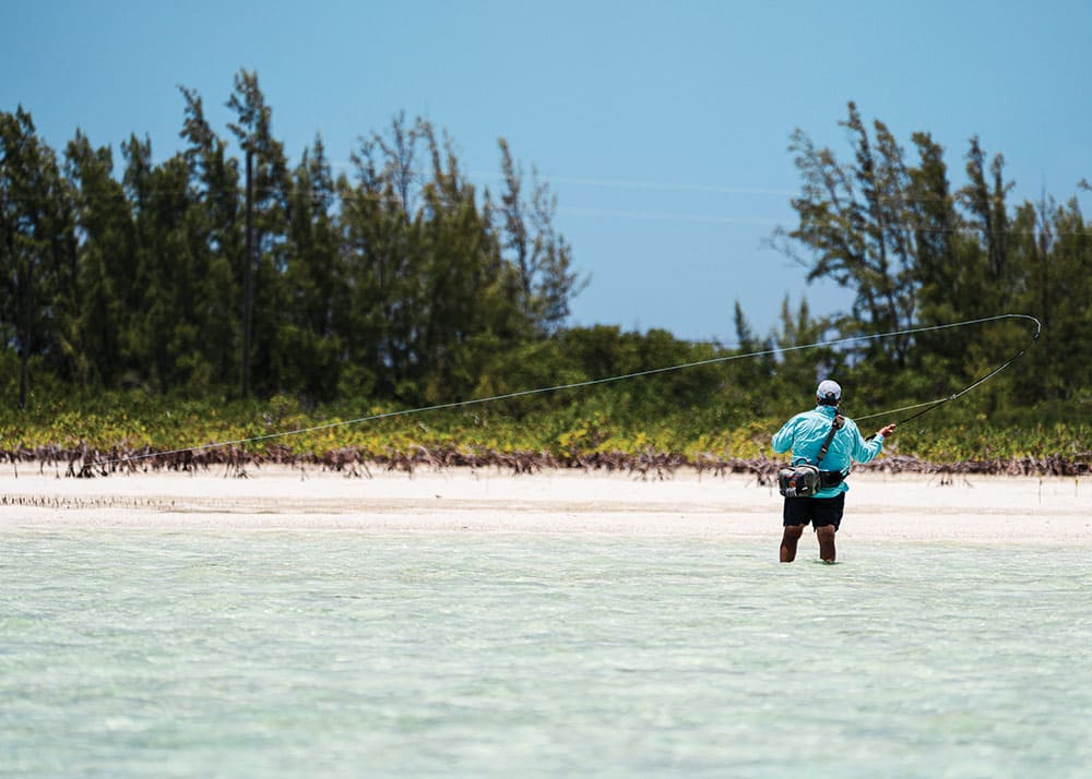 Alex Suescun casting a fly for bonefish