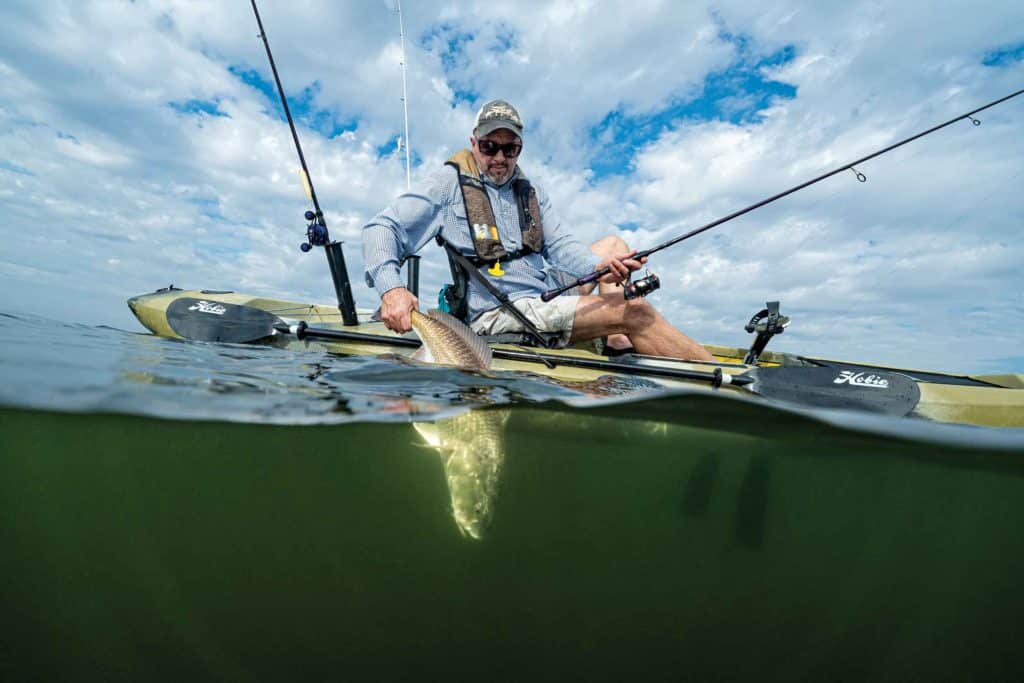 Catching a redfish from a kayak