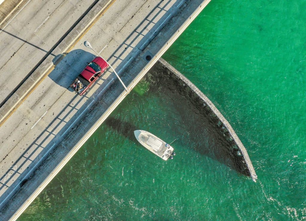 Fishing under a bridge