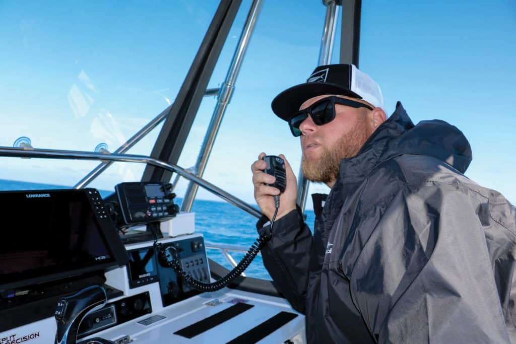 Fisherman scanning VHF channels for current fishing conditions