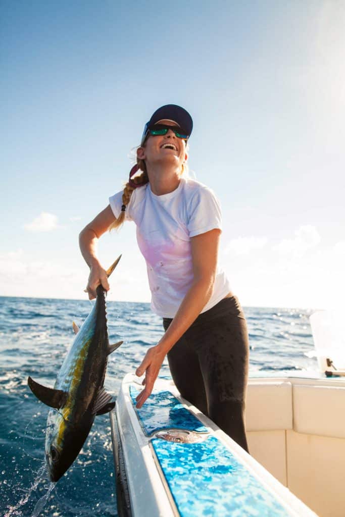 Large tuna being brought on board