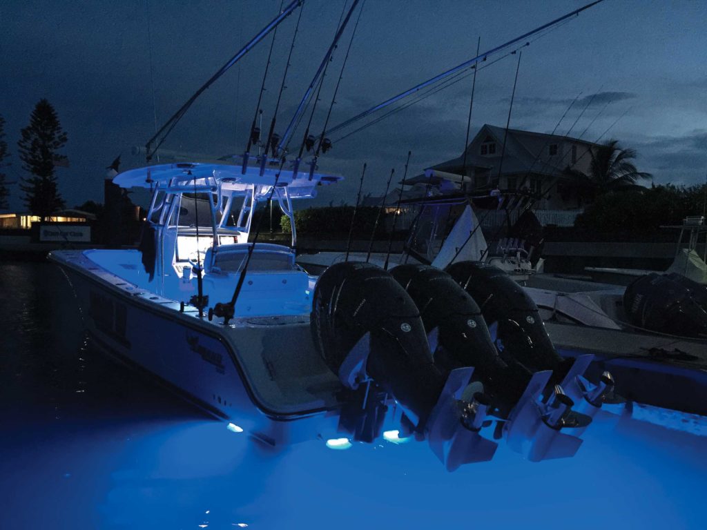 Launching a fishing boat with lights turned on