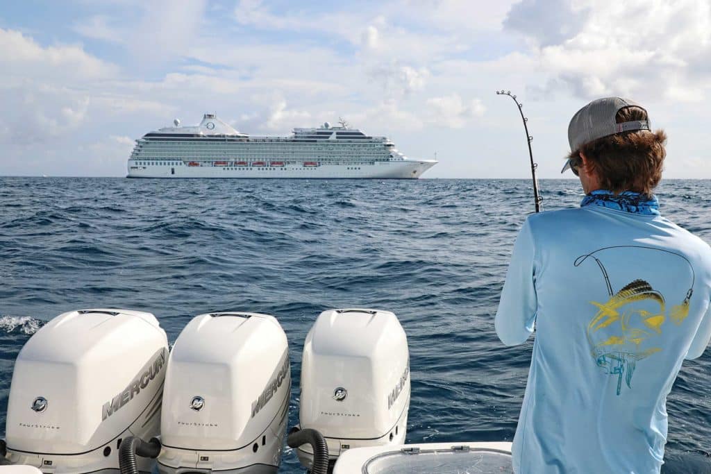 Hooked up with a fish near a cruise ship