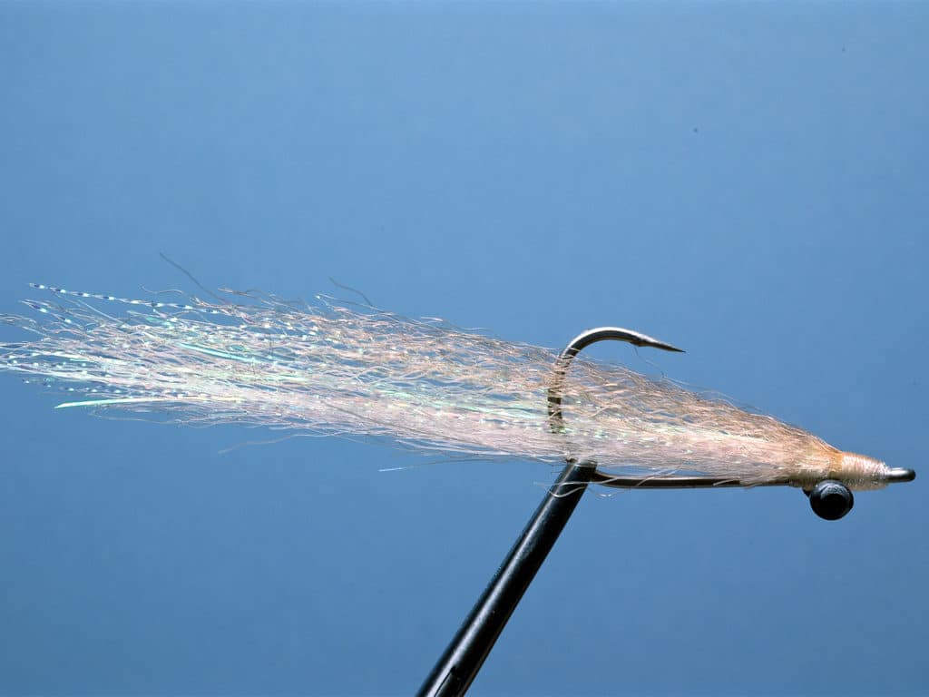 favorite patterns include Alba-Clousers, Jiggies and Surf Candies, tied with nylon or bucktail wings, in sizes 1/0 and 2/0.