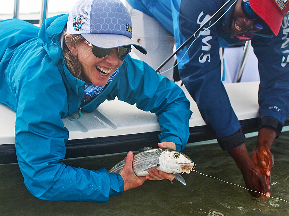 Kelly Bastone holds up an Abaco bonefish.
