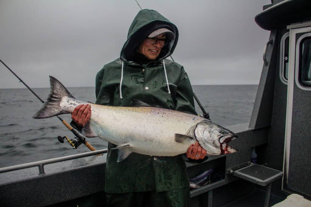 Large salmon brought on board