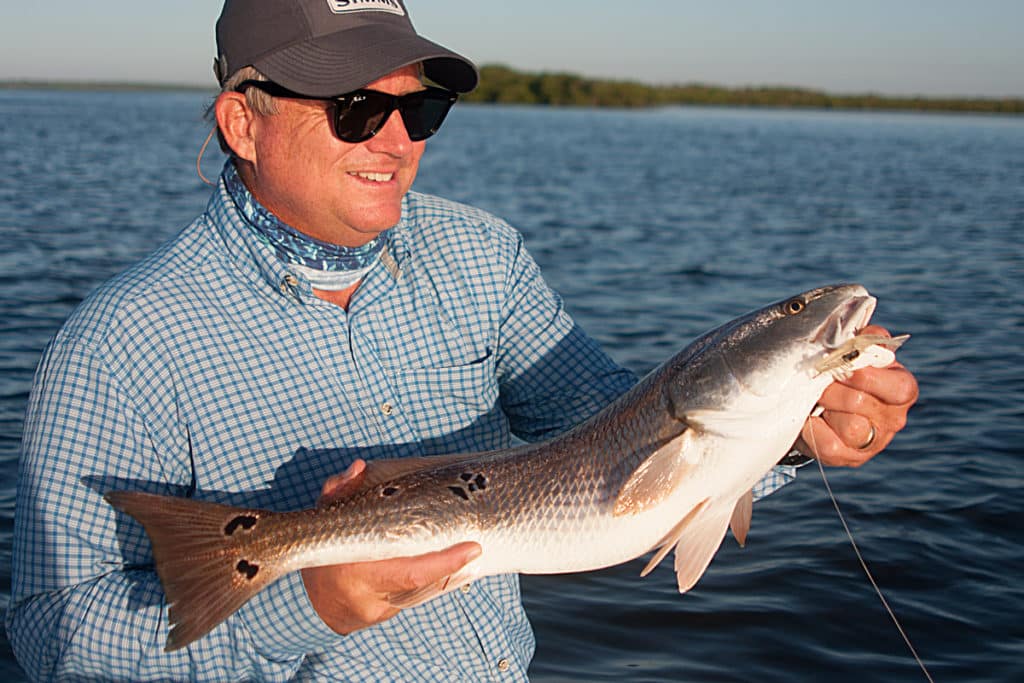 Keeping a low profile and moving slowly and quietly are the keys to success with redfish in Mosquito Lagoon.