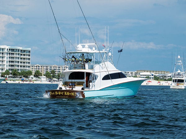 boat leaving docks in Destin