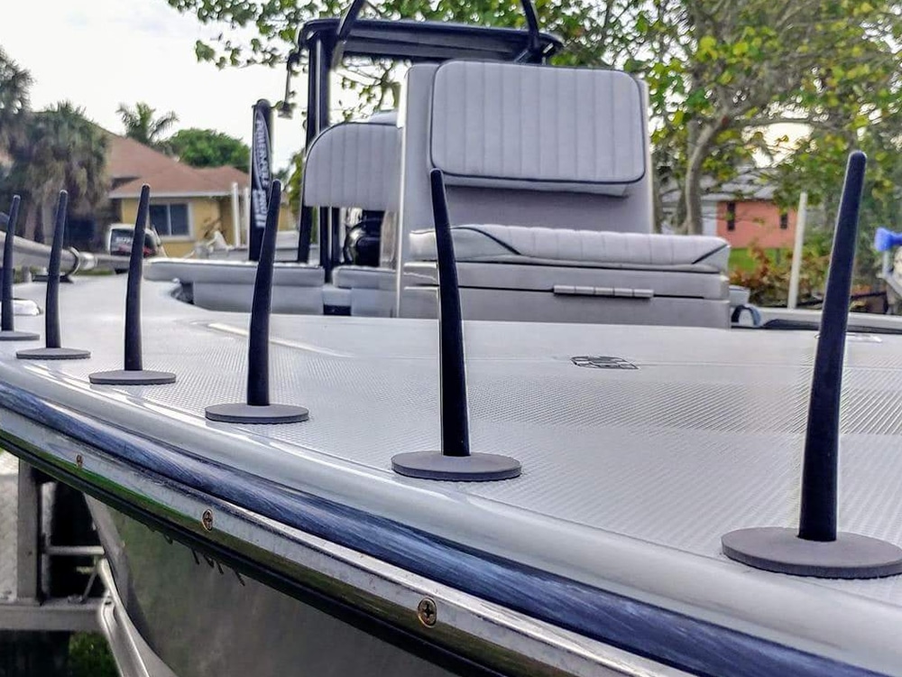 Carbon Marine's LineTack Light Fly Line Management Spikes on the bow of a flats boat