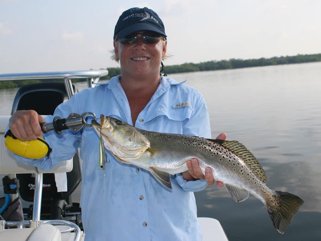 Trophy speckled trout seek potholes and channels when the tide drops.