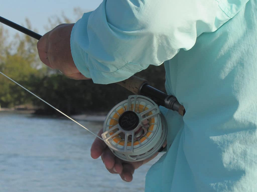 When you wade, you need less loose line off your reel than you do fishing from the skiff.