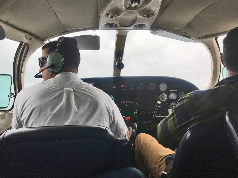 Air Flight pilot navigates in cloudy skies