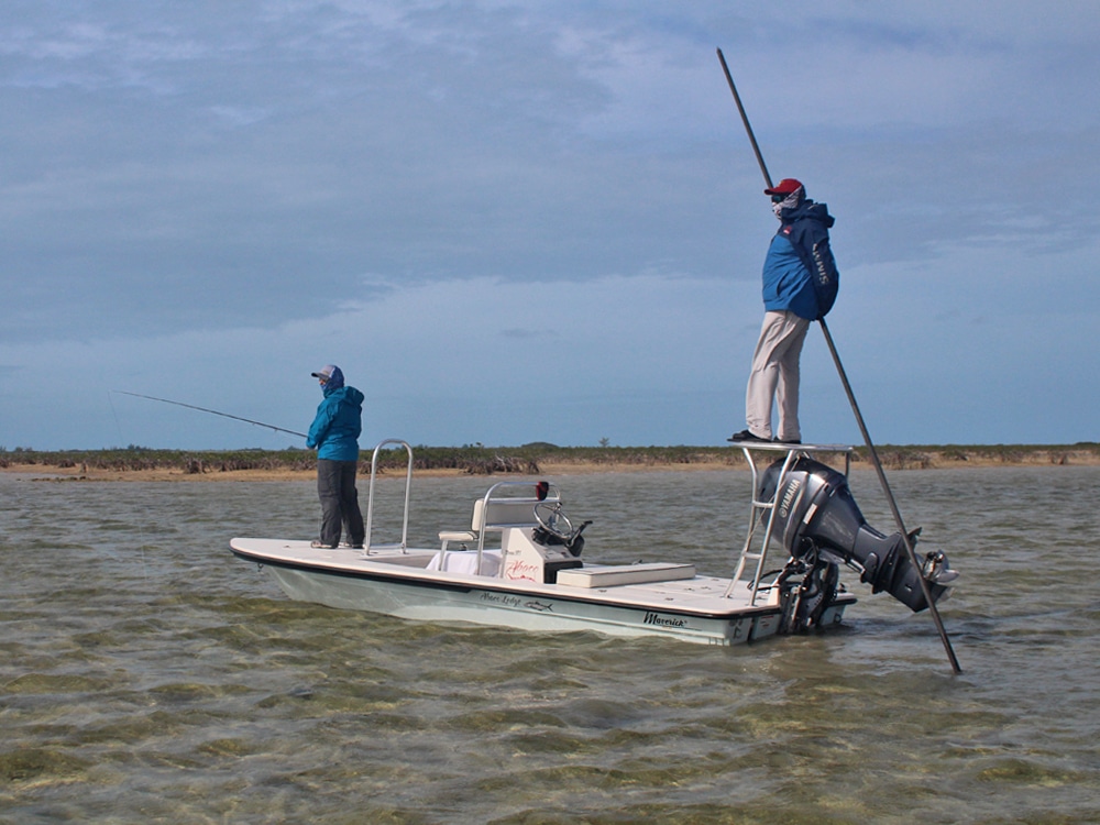 Abaco Lodge guide poles his skiff along the Marls