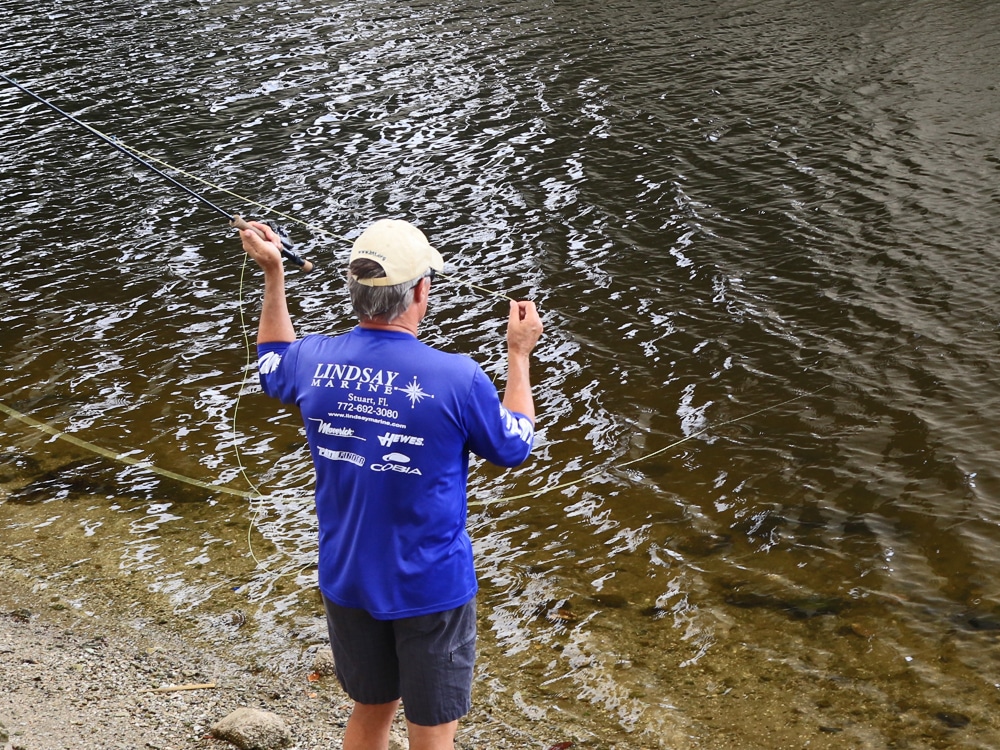 Part 2 of the Roll Cast is to stop the rod at the 10 o'clock position to let the fly line keep sliding toward you on the surface.