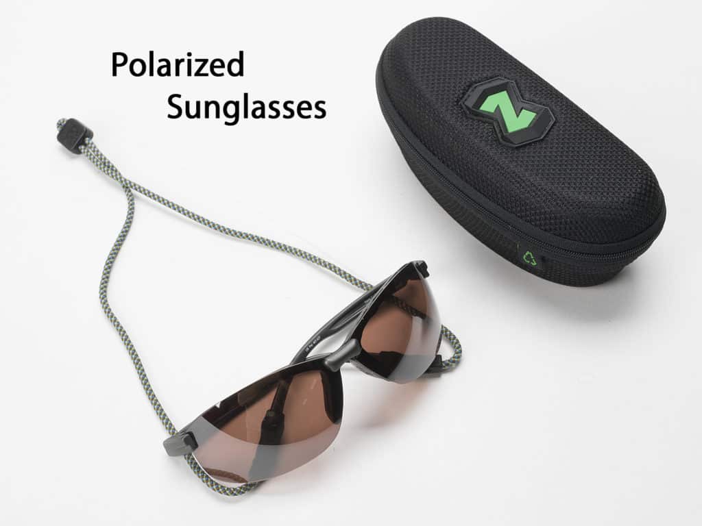 Top-grade polarized sunglasses, in brown or copper tint are a must, with amber a nice addition for low-light conditions.