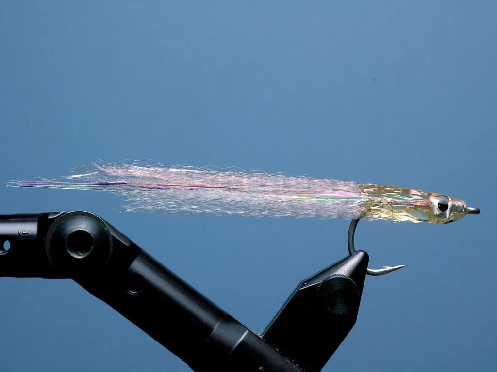 favorite patterns include Alba-Clousers, Jiggies and Surf Candies, tied with nylon or bucktail wings, in sizes 1/0 and 2/0.