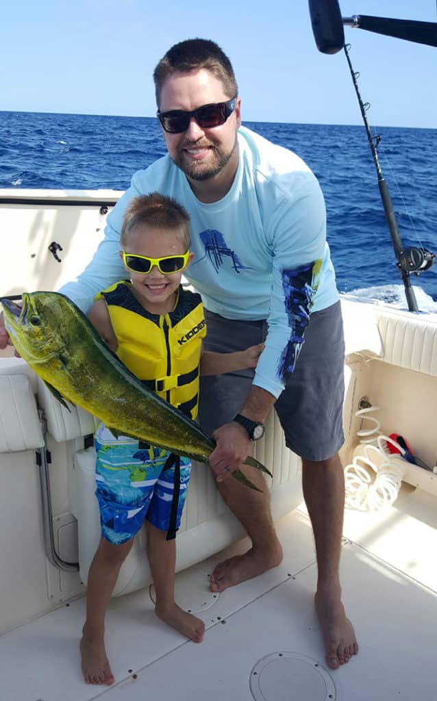 kid catches mahimahi