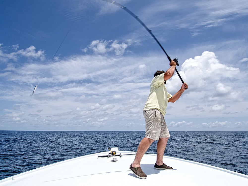 casting offshore from boat hull