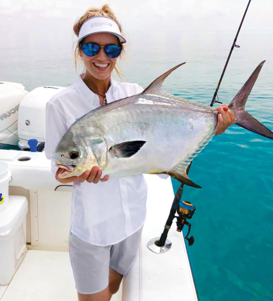 Angler holding up permit