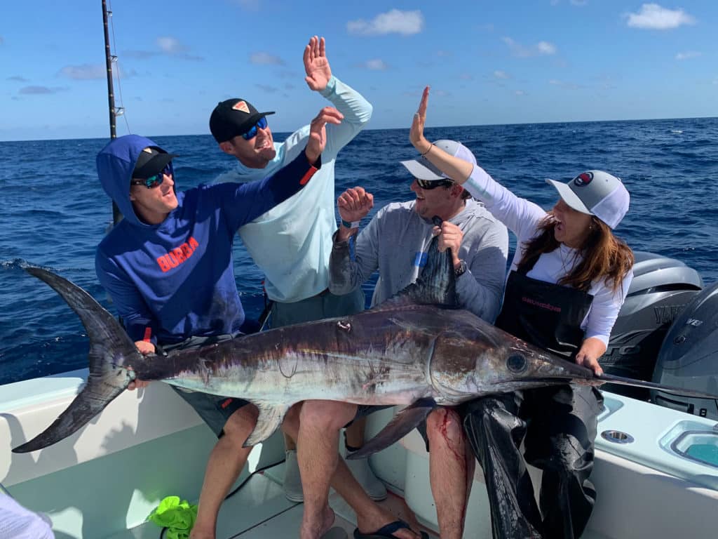 Anglers with a billfish