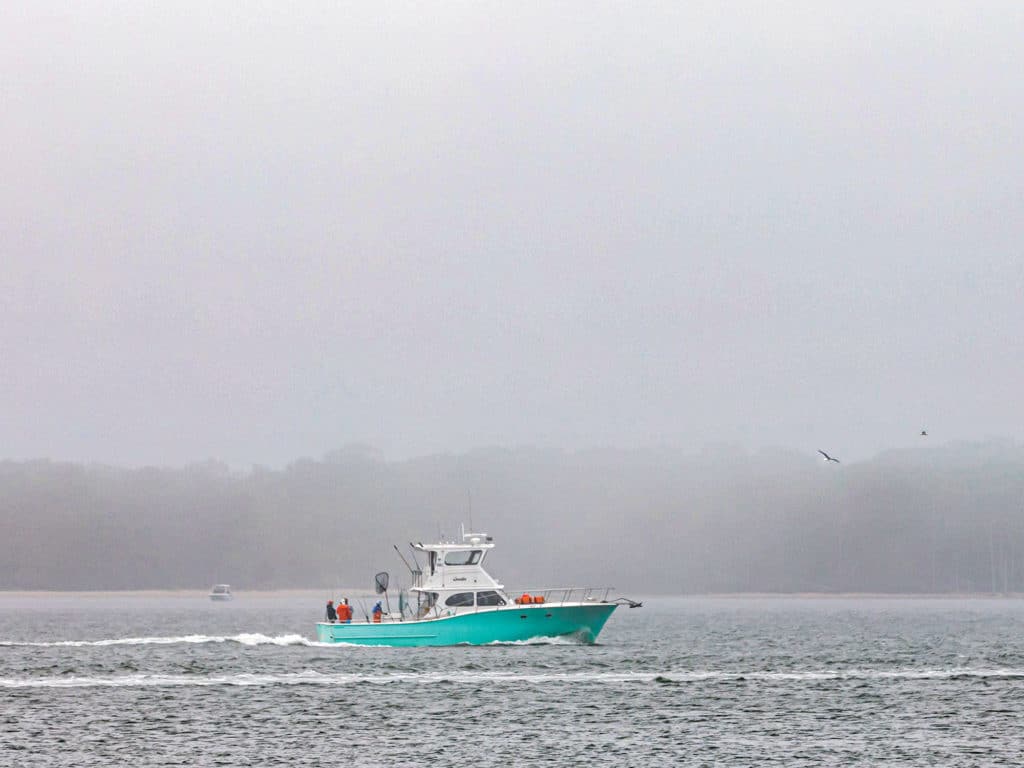 Fishing boat in the fog