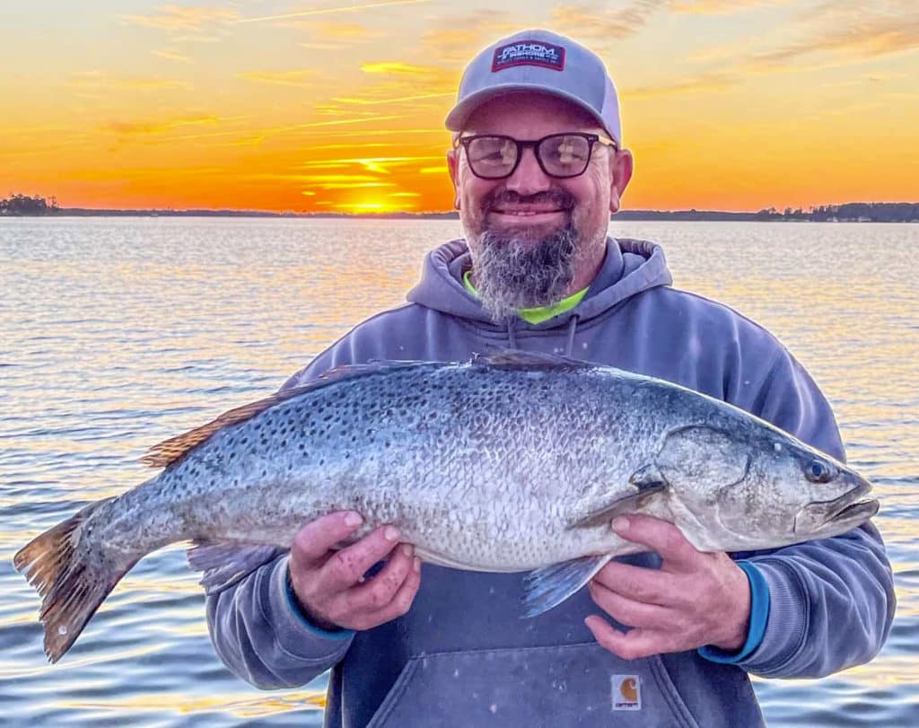 Todd Spangler holding sea trout