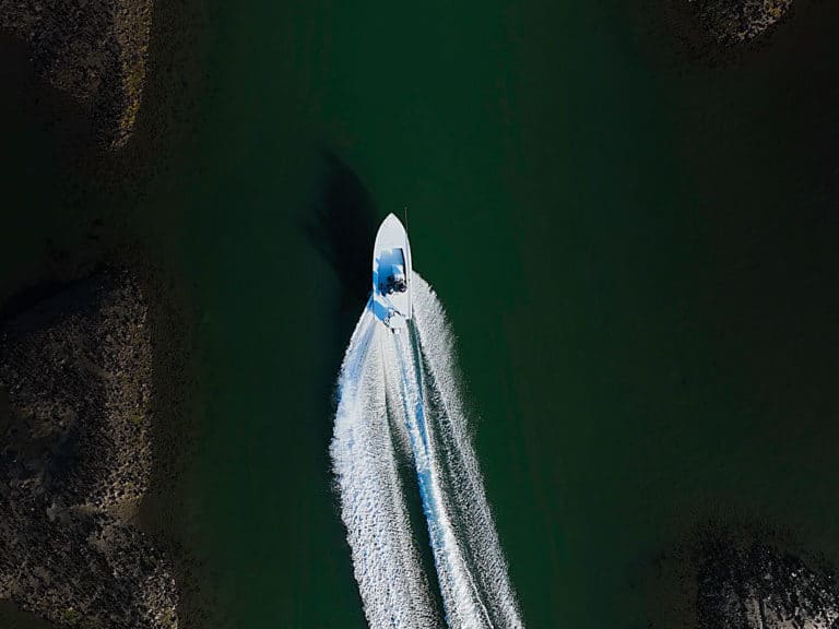 flats skiff running shot shallow water