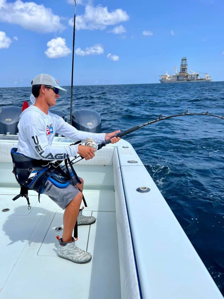 angler fighting tuna with stand up gear