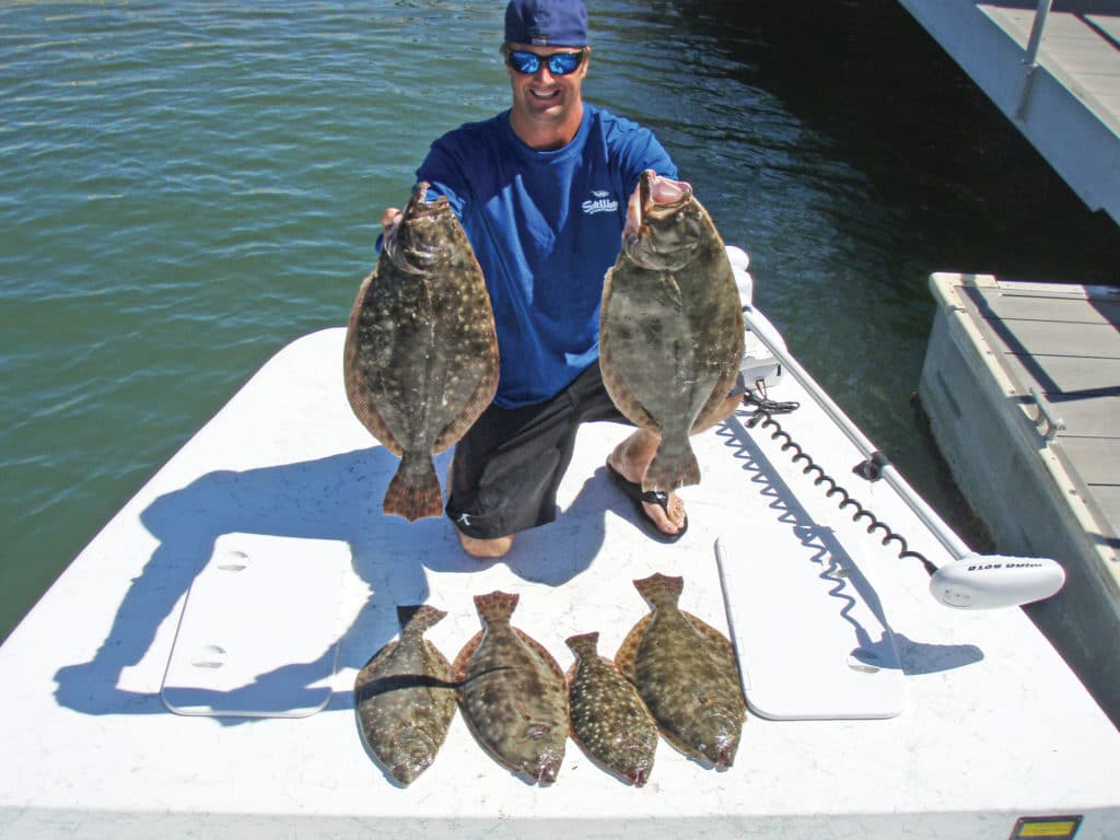 Flounder lined up on the deck