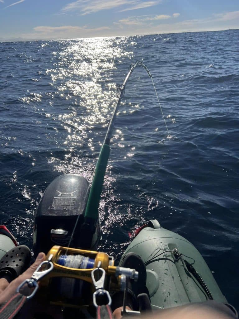 fighting swordfish in inflatable boat