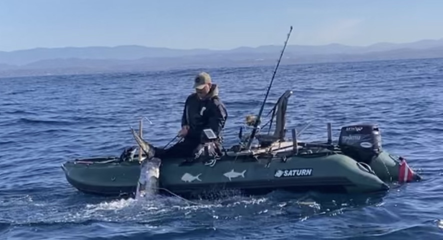 swordfish in inflatable raft