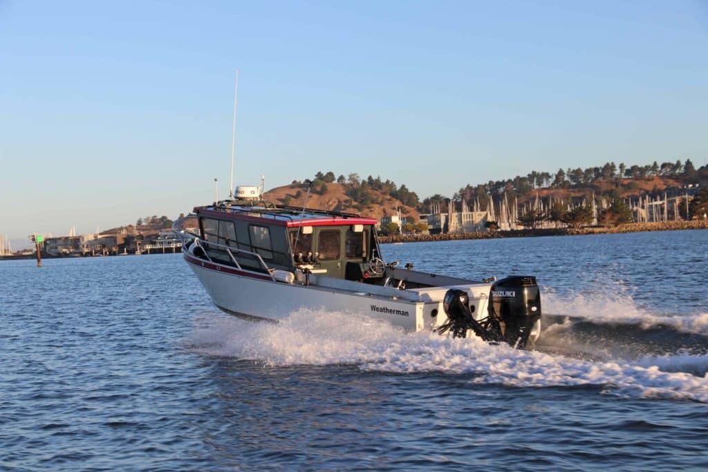 Suzuki outboard on pilothouse boat