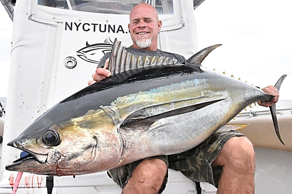 Capt. John McMurray with tuna