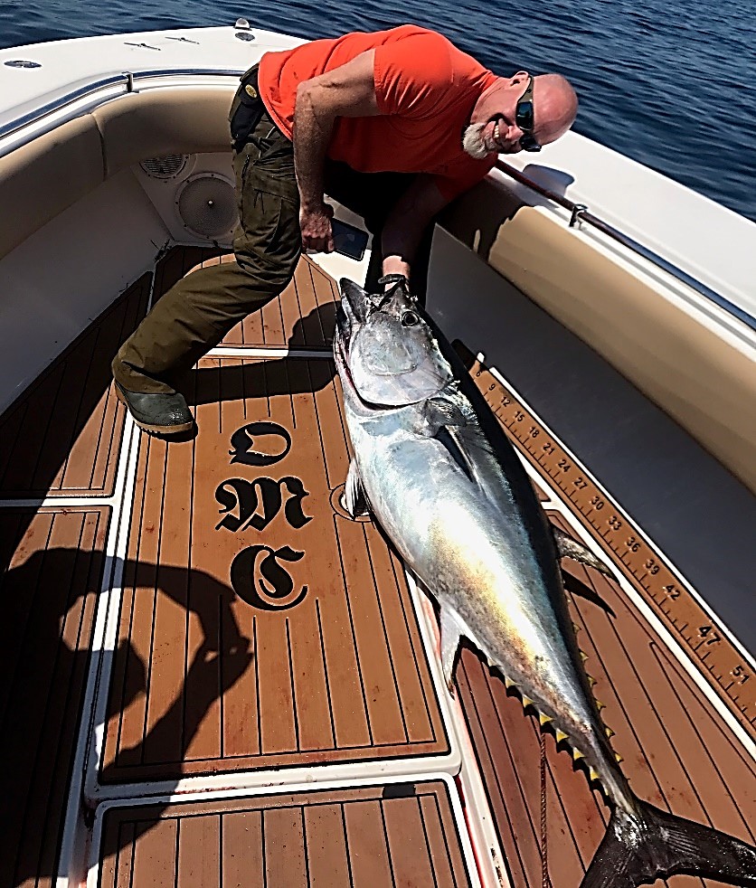 Capt. John McMurray with tuna on deck