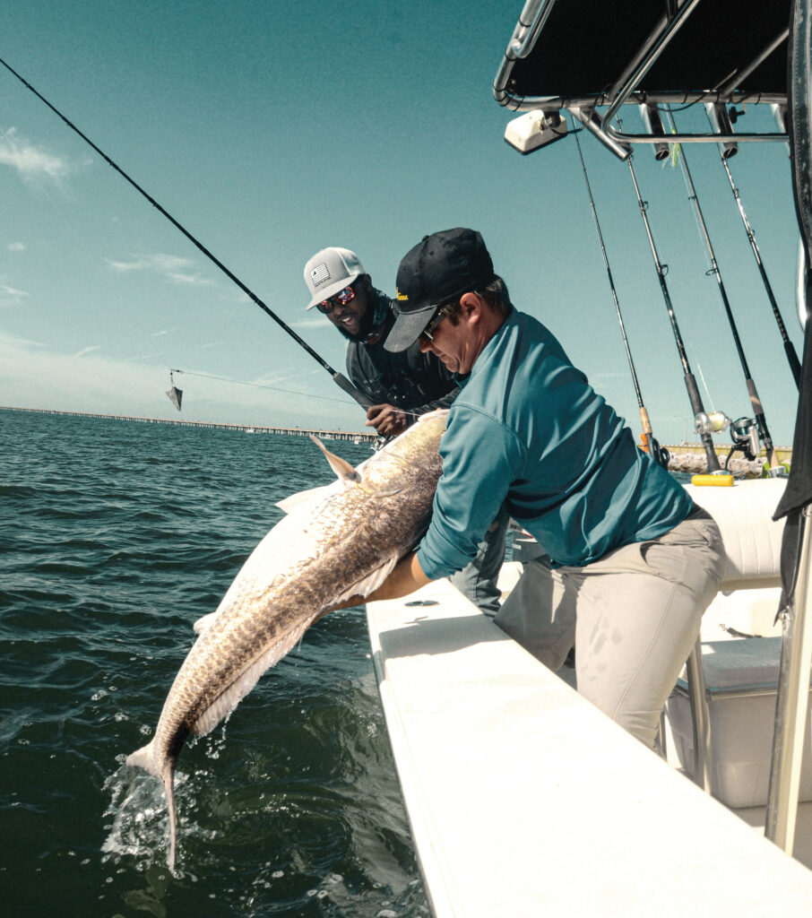 Large fish caught next to a bridge