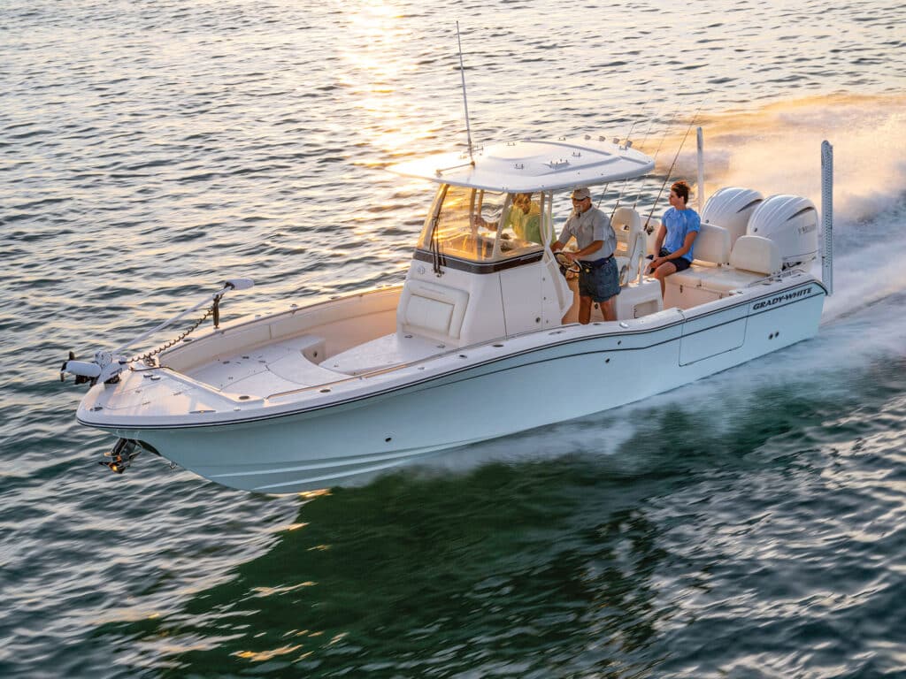 Grady-White 281 CE running at sunset