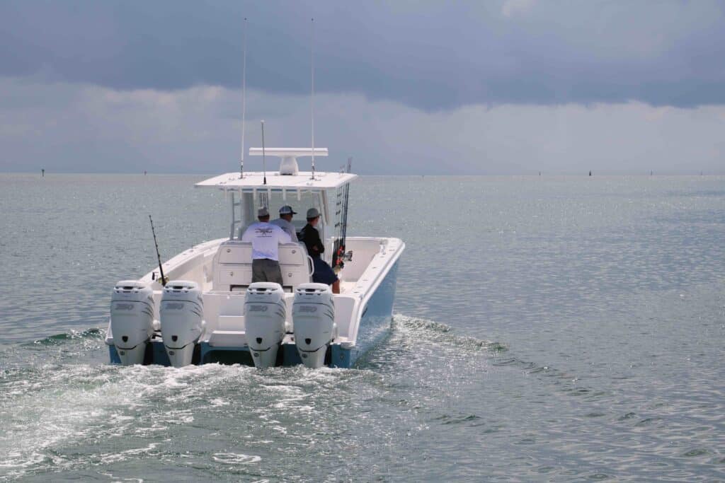 Canter console fishing boat with tall gunwales