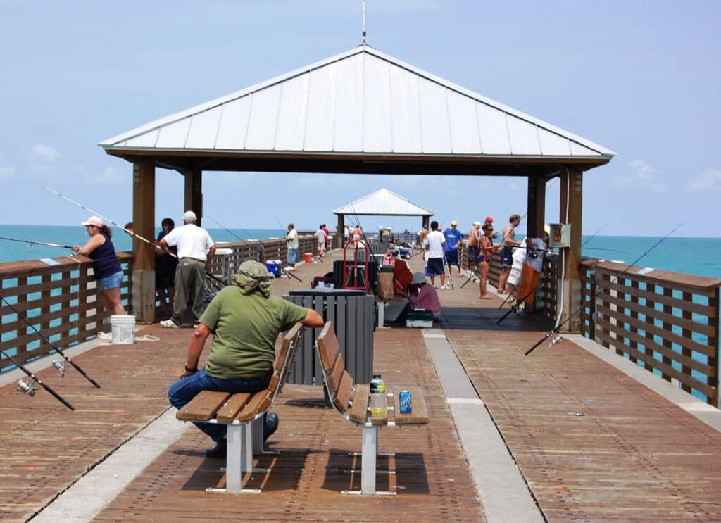 anglers fishing on pier