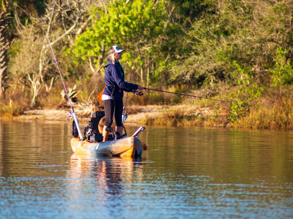 standing up and fishing from a kayak