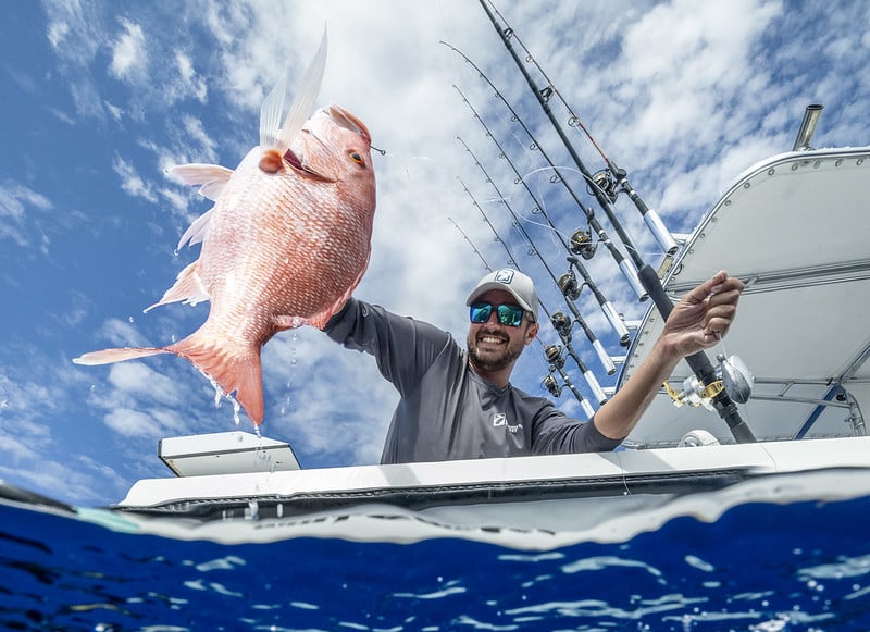 angler with reef fish