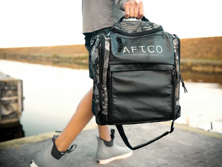 Soft-sided tackle bags and backpacks: Angler carrying AFTCO soft-sided bag