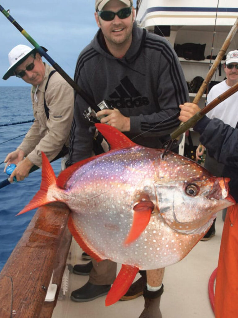 Fisherman with opah, or moonfish.