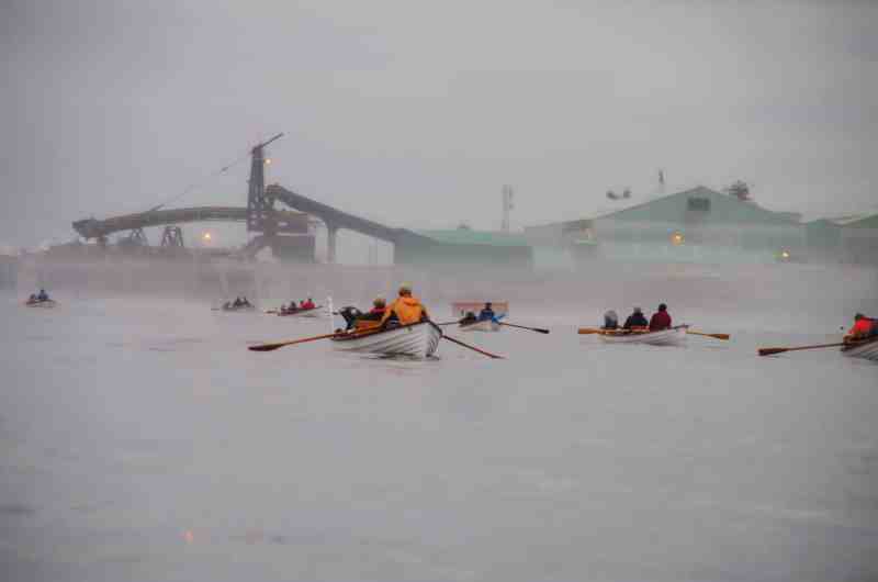 Fishermen rowing out at the Tyee Club