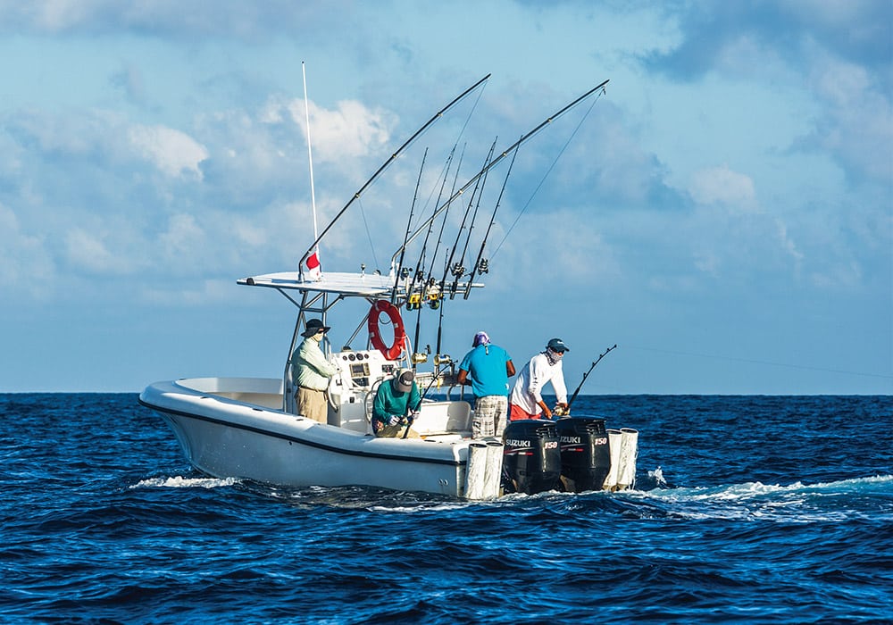 Midsize boat using a dredge