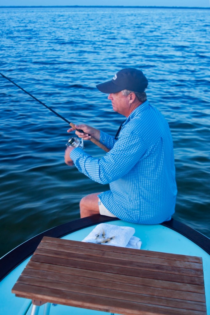Benson's stealthy approach involves pulling the skiff forward by sitting on the bow and walking across the bottom.