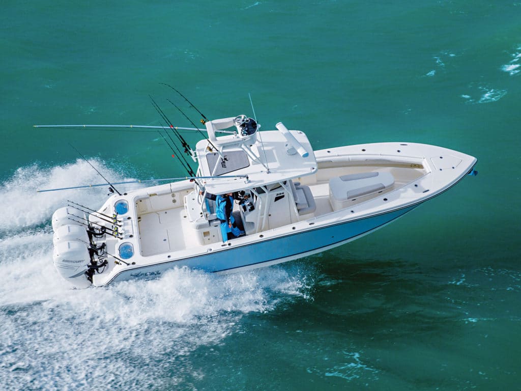 The new Mako 334 CC incorporates an aggressive deep-V, 24 degrees of deadrise, lifting strakes and a notched transom .