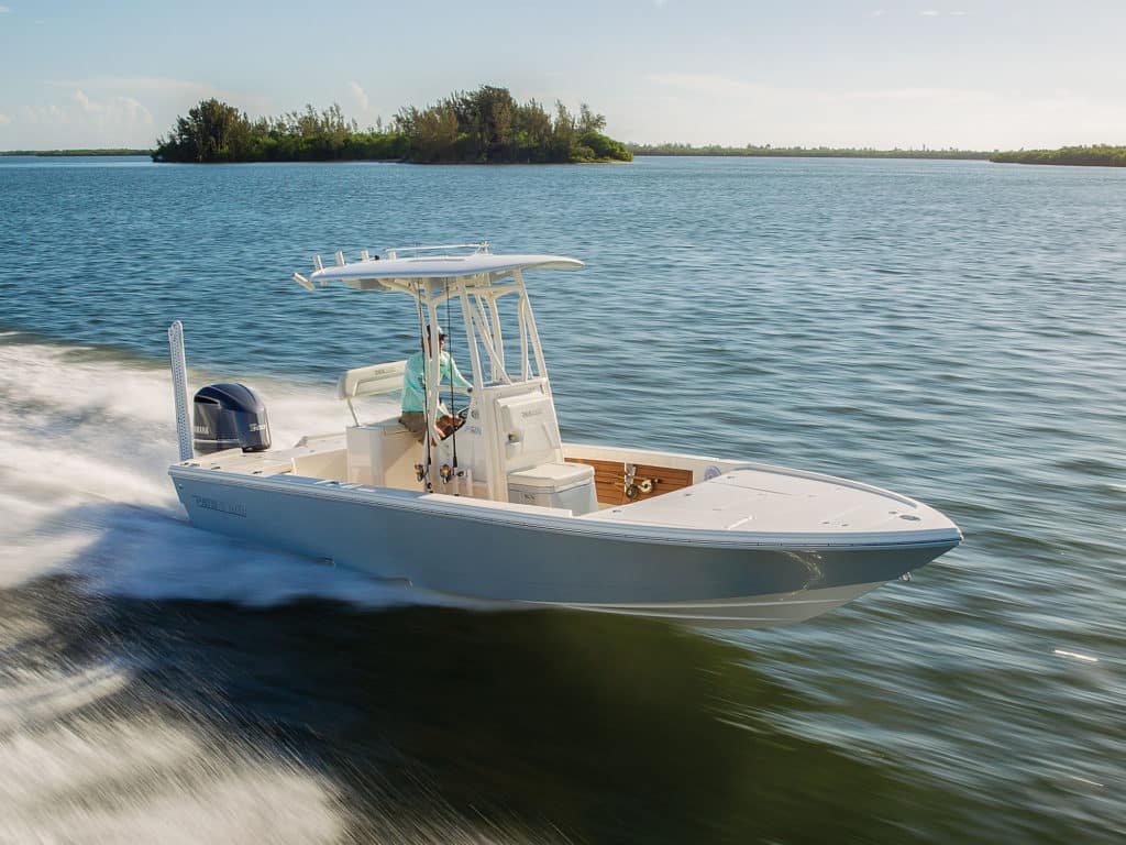 The Pathfinder 2500 Hybrid offers two helm seating options, both leaning-post configurations with tackle storage.